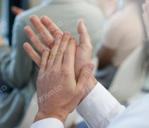 Preview: What a great presentation. Shot of a businessman giving a round of applause during a meeting.