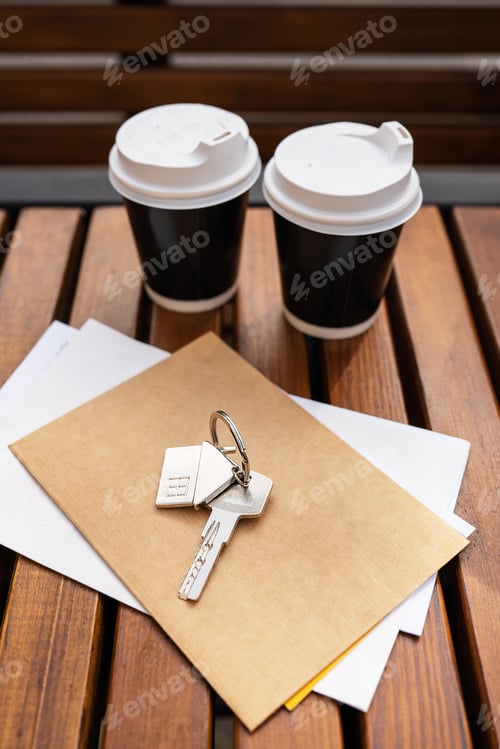 Preview: Coffee break - two cups in a plastic cup. Real estate, keys from the tenant from an apartment