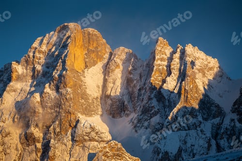 Preview: Beautiful scenic view of the Mountains of Pale di San Martino during sunset