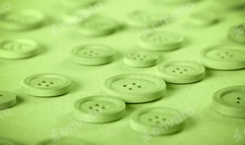 Preview: Wooden Buttons Lie On A Bright Background