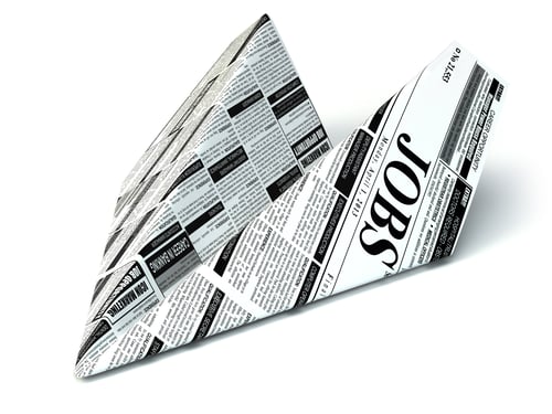 Preview: Job seeking concept. Newspaper as paper airplane.