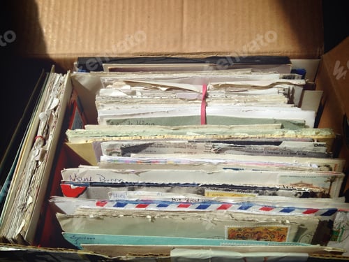 Preview: collection of old love letters in a shoebox. cardboard box full of memories and memorabilia