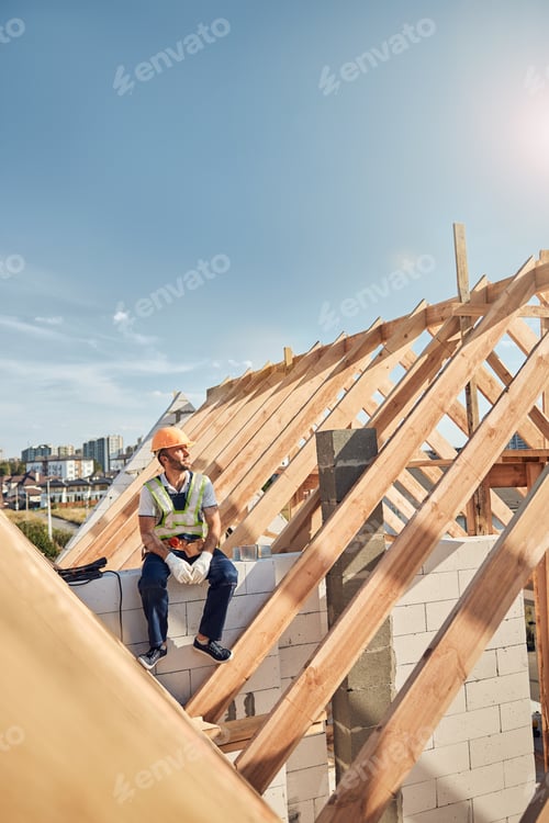 Preview: Hard-working builder taking a break from work