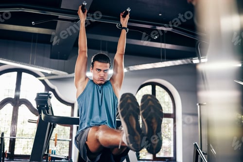 Preview: Fitness, pull ups workout and man in gym on bars training for health, wellness and strength. Energy