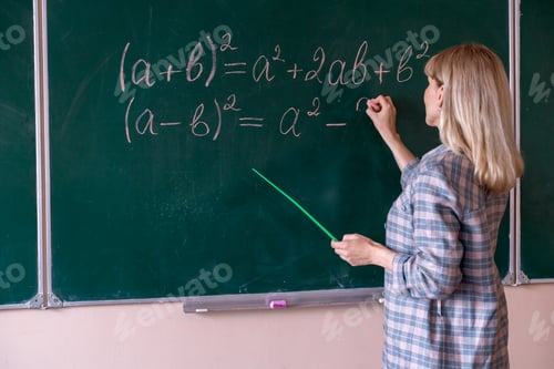 Preview: Back to school. The professor solves the problem at the blackboard