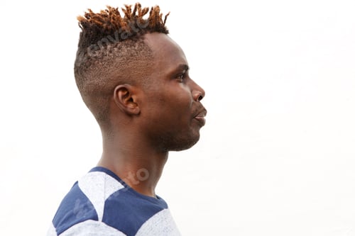 Preview: Side portrait of handsome young afro american man against white background