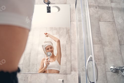 Preview: Young lady having fun in the bathroom