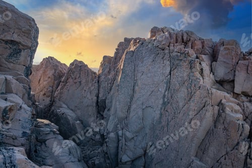 Preview: Rocks on the beach near the Black Sea against the background of the sky with clouds