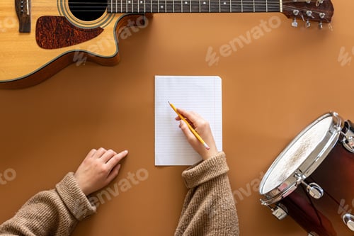 Preview: Musical background with musical instruments, flat lay, music creation concept.