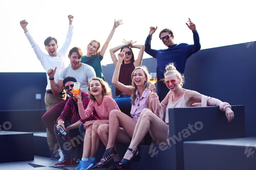 Preview: Young colleagues enjoying their corporate party