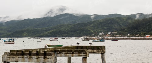 Preview: Pier at Zimbros beach on a rainy day, Bombinhas, Santa Catarina state, Brazil
