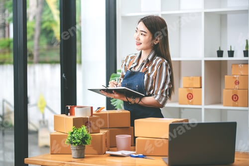 Preview: Small start-up business owners checking parcels at work, freelancers, salespeople, checking producti