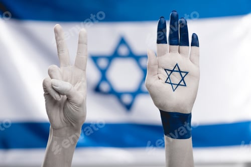 Preview: cropped view of female hands with star of david showing peace sign near flag