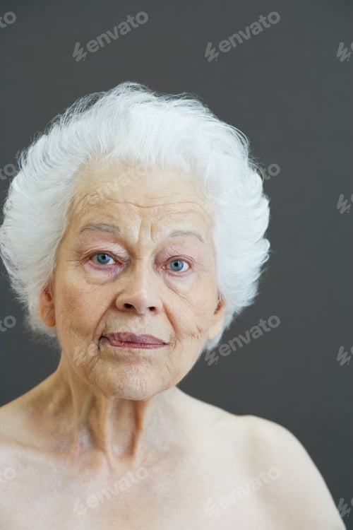 Preview: Elderly woman with a contemplative gaze