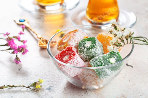Preview: various pieces of turkish delight lokum and black tea