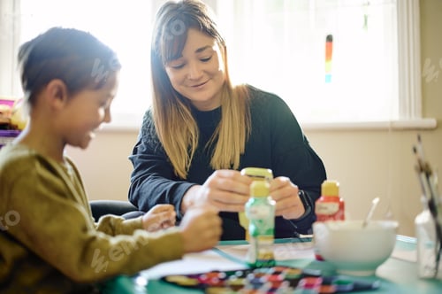 Preview: Education, paint or art with a mother and son in a playroom together for child development or learn