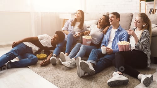 Preview: Happy friends watching comedy movie at home