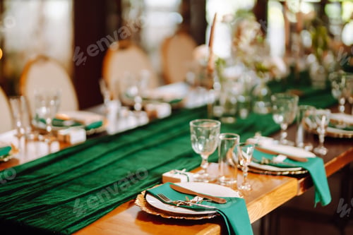 Preview: Banquet table in the restaurant, preparation before the banquet. The work of professional florists.