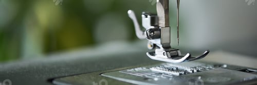Preview: Close up of Sewing Machine Needle and Presser Foot Operating in Workshop