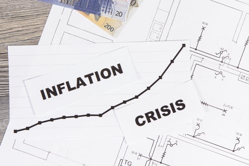 Preview: Inscriptions crisis and inflation, currencies Euro on electrical construction drawing of house