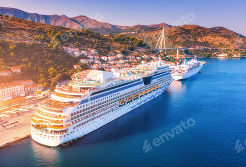 Preview: Aerial view of beautiful large white cruise ships at sunset