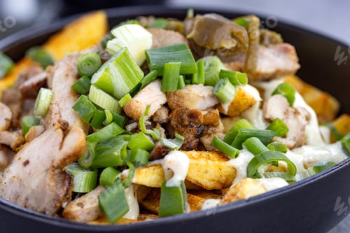 Preview: Chicken salad in bowl with mayonnaise and fresh herbs.