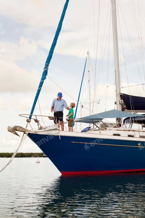 Preview: Grandfather and granddaughter bonding on a sailboat