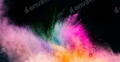 Preview: Holi powder blowing up on black background.