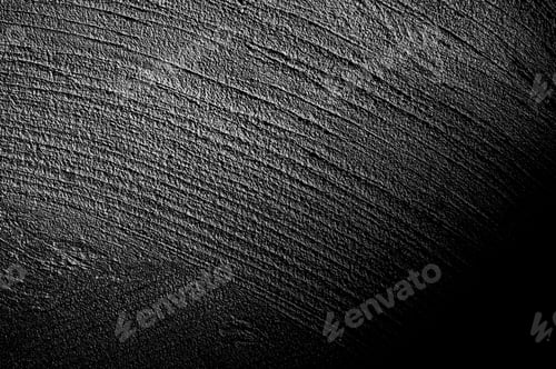 Preview: Wall grunge black concrete with light background.