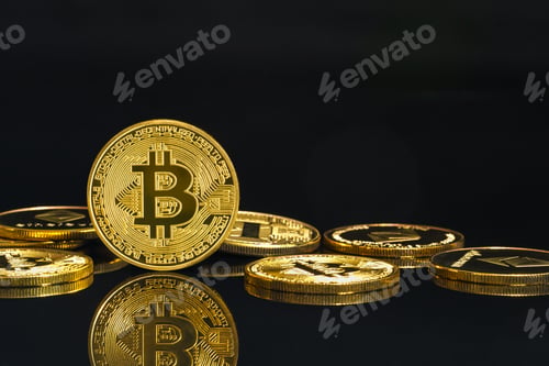 Preview: Golden coins with Bitcoin cryptocurrency symbol on black