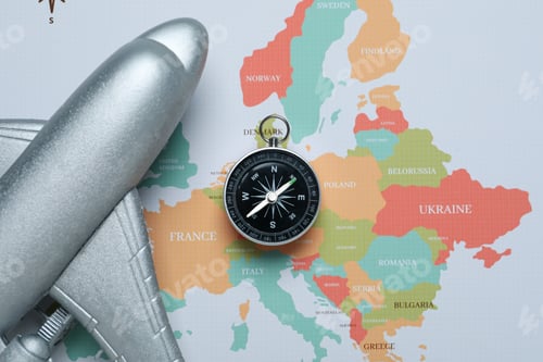 Preview: Traveling, adventure and vacation concept with compass