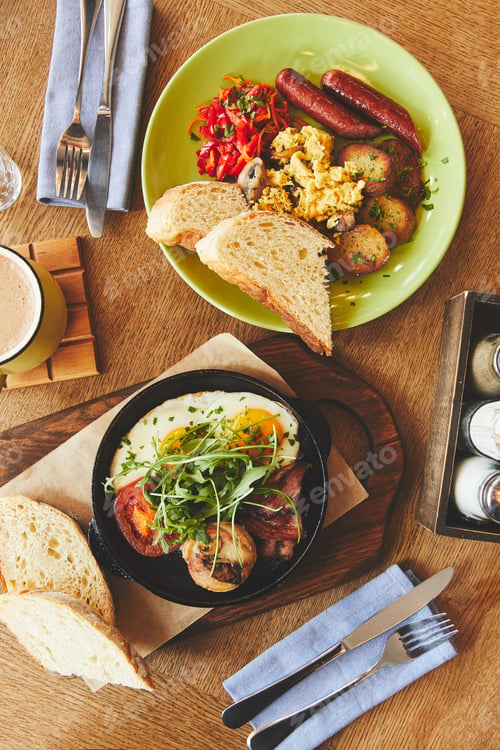 Preview: Breakfast with fried eggs and coffee on table