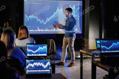 Preview: Graph is going up. Male business trainer is against projector with data, teaching people