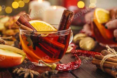 Preview: Christmas composition with Glass of glint wine on wooden table close up
