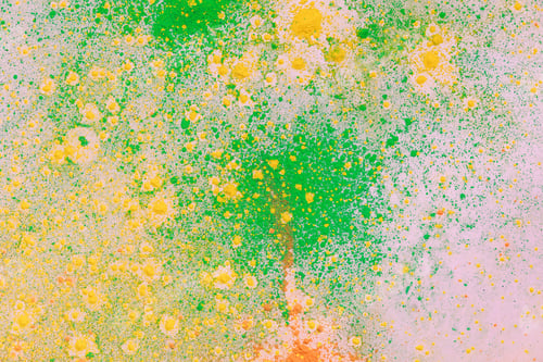Preview: orange, yellow and green colorful holi paint explosion