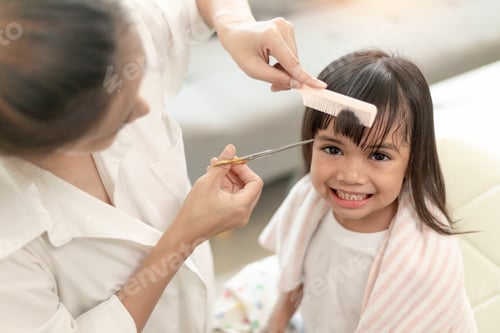 Preview: Girl Getting a Haircut by Adult with Comb