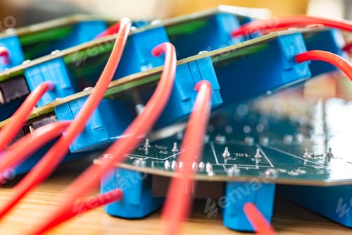 Preview: Close-up of a large green microcircuit with blue components