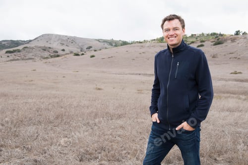 Preview: Portrait of mature man in hilly landscape