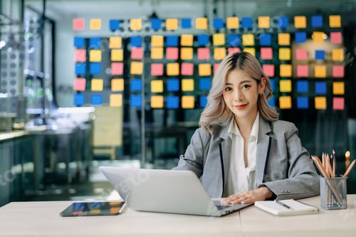 Preview: Young attractive Asian female office worker business suits smiling at camera in office