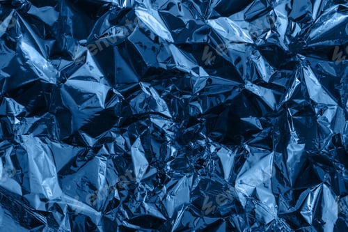 Preview: Blue deformed cellophane, foil or plastic. Creative crumpled background