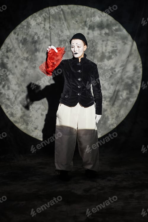 Preview: Mime Performing on Stage in Black and White