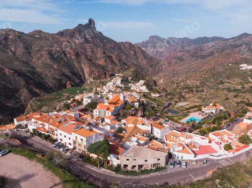 Preview: Drone view of city in mountain valley