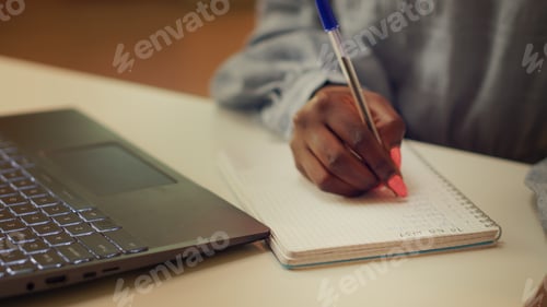 Preview: Woman taking handwritten ideas notes