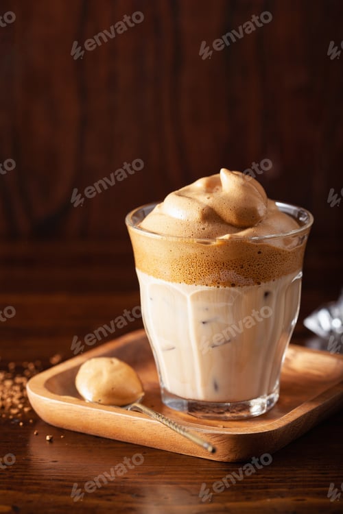 Preview: dalgona coffee in glass. trendy Instant coffee whipped with sugar and hot water