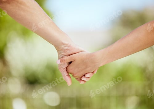 Preview: Life is better with you in it. Cropped shot of a woman holding her sons hand while walking outside.