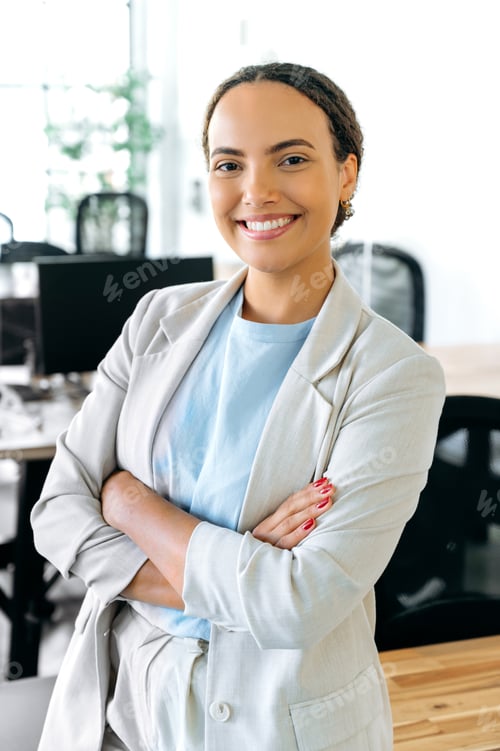 Preview: Vertical photo of an elegant successful young lovely mixed race business woman, with a perfect white