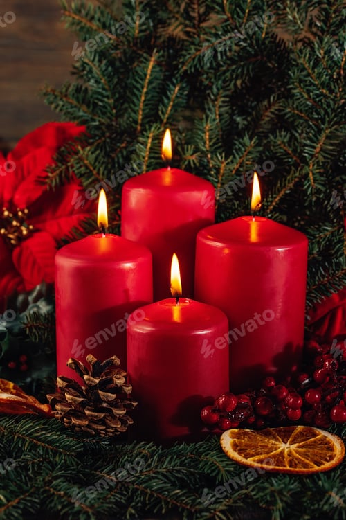 Preview: Red candles in advent wreath decoration on wooden dark background