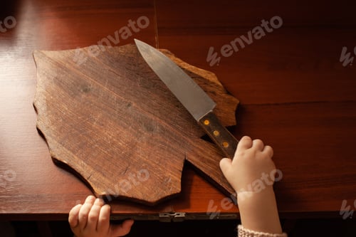 Preview: The child pulls a knife from the table. The child can cut, children's home dangers. A little one