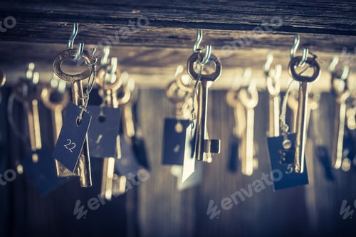 Preview: Aged hotel with keys for rooms