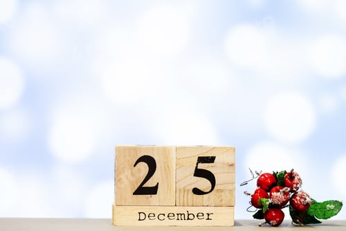 Visualização: 25 de dezembro e decoração de natal em fundo azul